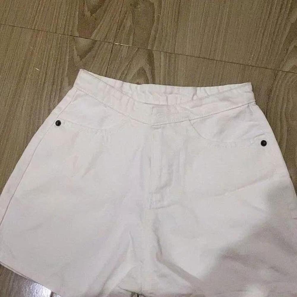 White High-Waisted Shorts With Black Buttons